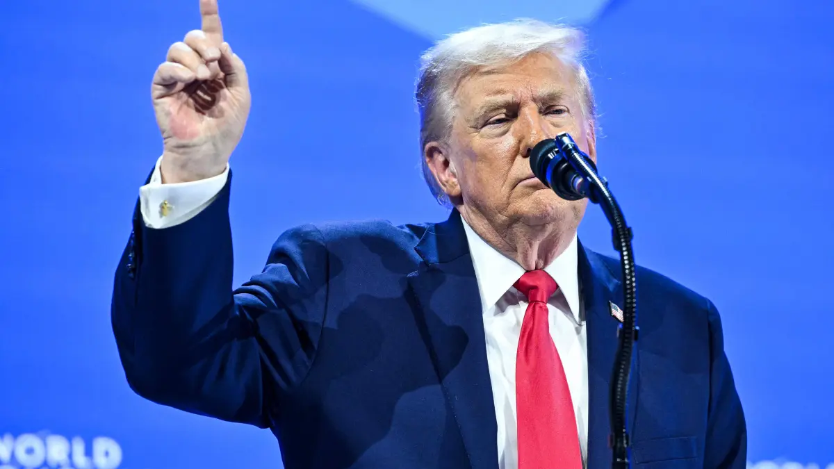 US President Donald Trump gestures as he delivers a special address during the World Economic Forum (WEF) annual meeting in Davos on January 21, 2026. The World Economic Forum takes place in Davos from January 19 to January 23, 2026. (Photo by Mandel NGAN / AFP)