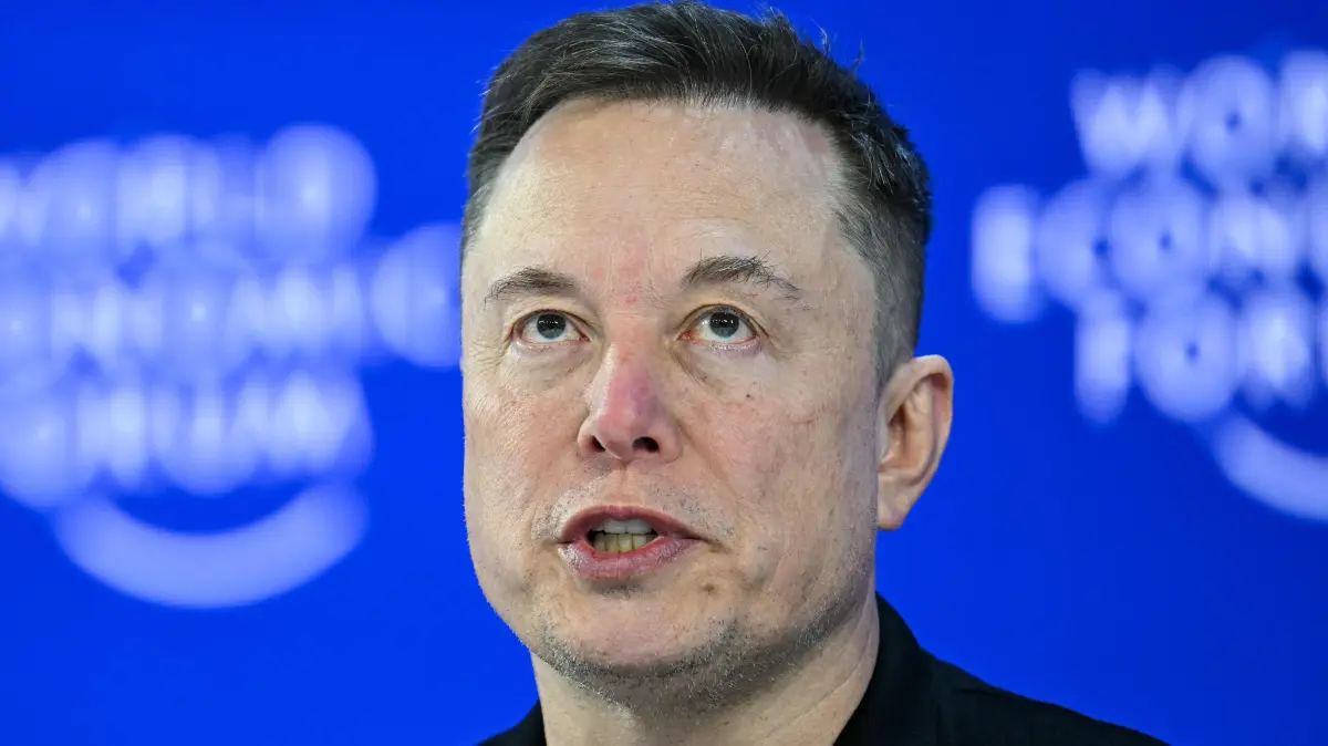 CEO of SpaceX and Tesla, South African-Canadian-US businessman Elon Musk speaks during the World Economic Forum (WEF) annual meeting in Davos on January 22, 2026. The World Economic Forum takes place in Davos from January 19 to January 23, 2026. (Photo by Fabrice COFFRINI / AFP)
