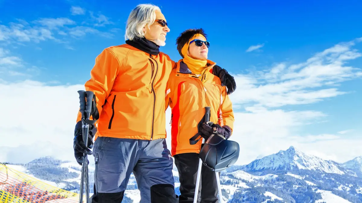 senior couple skiing