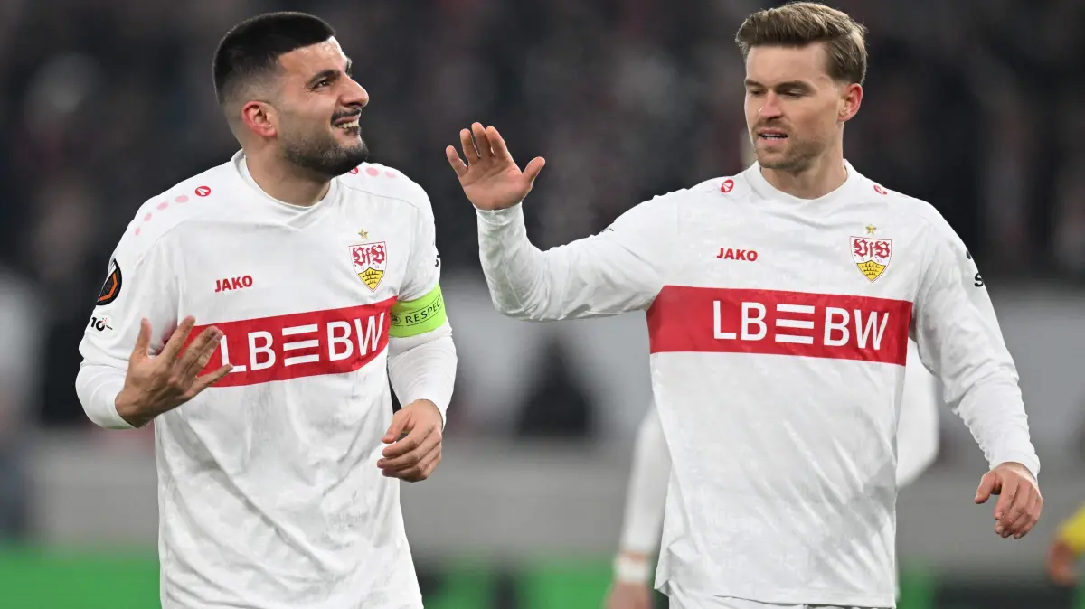Stuttgart's German forward #26 Deniz Undav (L) celebrates with Stuttgart's German defender #07 Maximilian Mittelstaedt scoring the opening goal during the UEFA Europa League Group first round day 8 football match between VfB Stuttgart and Young Boys in Stuttgart, on January 29, 2026. (Photo by THOMAS KIENZLE / AFP)
