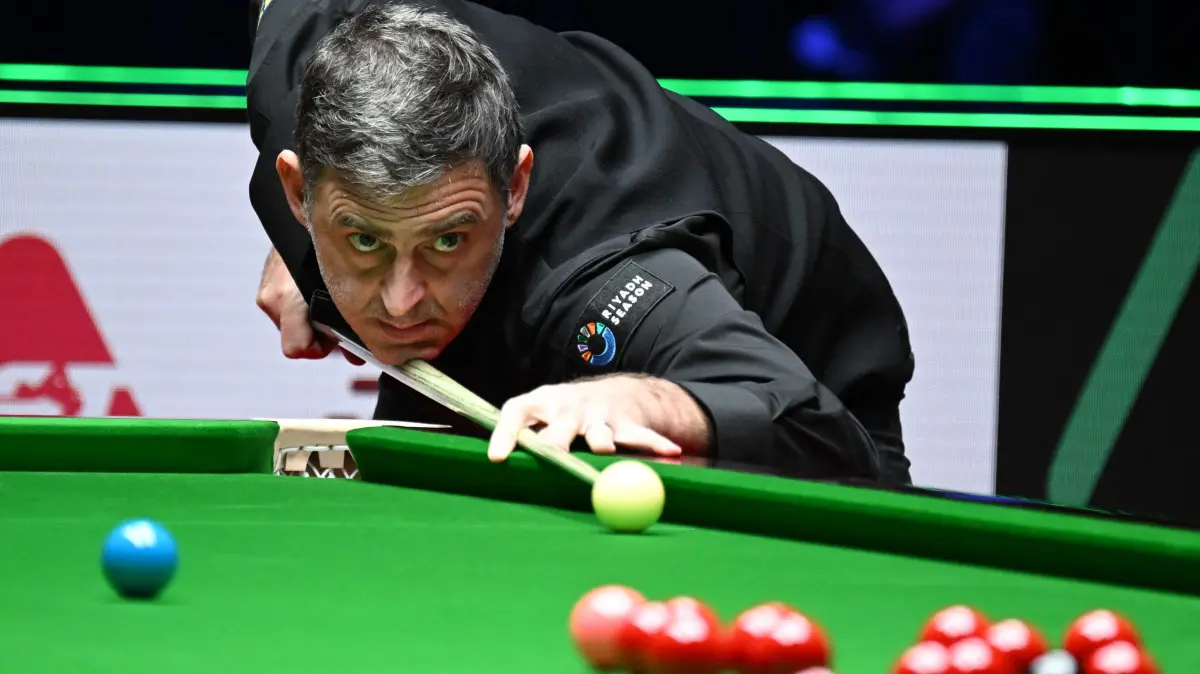 Britain's Ronnie O'Sullivan plays a shot against against compatriot Joe O'Connor in round 1 of the Snooker World Grand Prix 2026 in Hong Kong on February 4, 2026. (Photo by Peter PARKS / AFP)