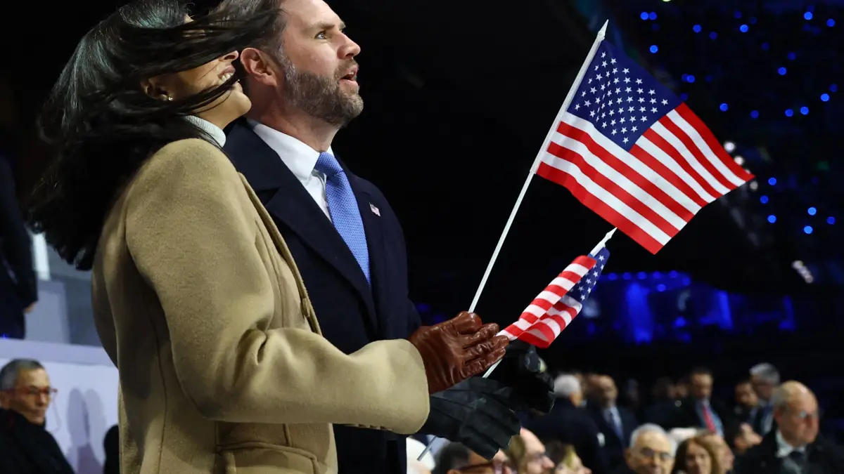 US Vice President JD Vance and US second lady Usha Vance watch the opening ceremony of the Milano Cortina 2026 Winter Olympic Games at the San Siro stadium in Milan, northern Italy, on February 6, 2026. (Photo by Susana Vera / POOL / AFP)