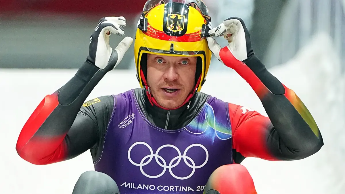 Olympische Winterspiele 2026: 08.02.2026, Italien, Cortina D'ampezzo: Olympia, Olympische Winterspiele Mailand Cortina 2026, Rodeln, Einsitzer, Männer, Durchgang 4, Felix Loch (Deutschland) reagiert im Ziel. Foto: Michael Kappeler/dpa +++ dpa-Bildfunk +++