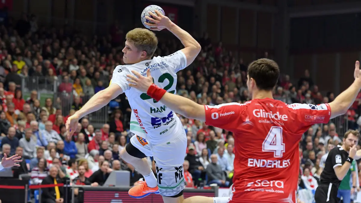 GER, MT Melsungen - Frisch Auf Goeppingen, Handball, 1. Bundesliga, 21. Spieltag, Saison 2025/2026, 14.02.2026: Martin Hanne (Frisch Auf Goeppingen #42) beim Wurf; Nikolaj Enderleit (MT Melsungen #4) ,
GER, MT Melsungen - Frisch Auf Goeppingen, Handball, 1. Bundesliga, 21. Spieltag, Saison 2025/2026, 14.02.2026,
Foto: Eibner-Pressefoto / Roland Sippel