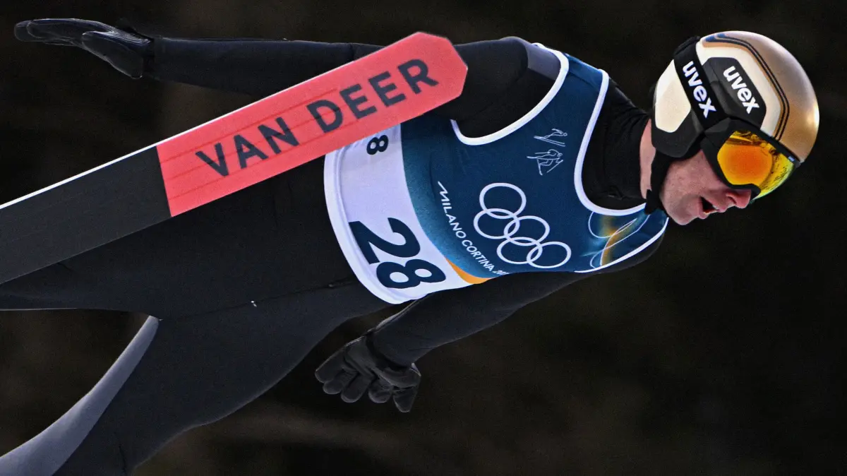776396146: Germany's Vinzenz Geiger competes in the ski jumping event of the nordic combined individual Gundersen large hill/10km at Predazzo Ski Jumping Stadium in Predazzo (Val di Fiemme) during the Milano Cortina 2026 Winter Olympic Games on February 17, 2026. (Photo by Javier SORIANO / AFP)