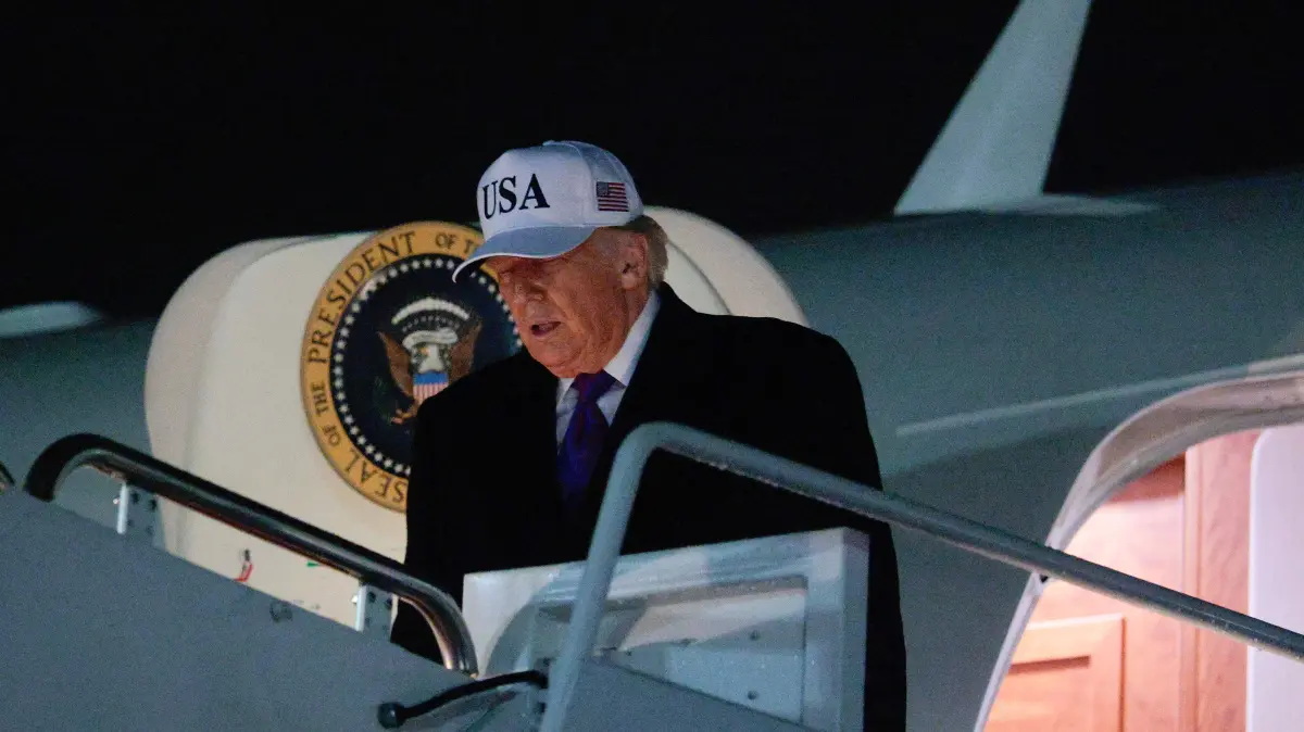 President Trump Returns To Washington From Georgia: JOINT BASE ANDREWS, MARYLAND - FEBRUARY 19: U.S. President Donald Trump steps off of Air Force One after returning to the nation's capital on February 19, 2026 at Joint Base Andrews, Maryland. Trump traveled to Rome, Georgia, and spoke about the economy while visiting a steel plant and restaurant. Chip Somodevilla/Getty Images/AFP (Photo by CHIP SOMODEVILLA / GETTY IMAGES NORTH AMERICA / Getty Images via AFP)