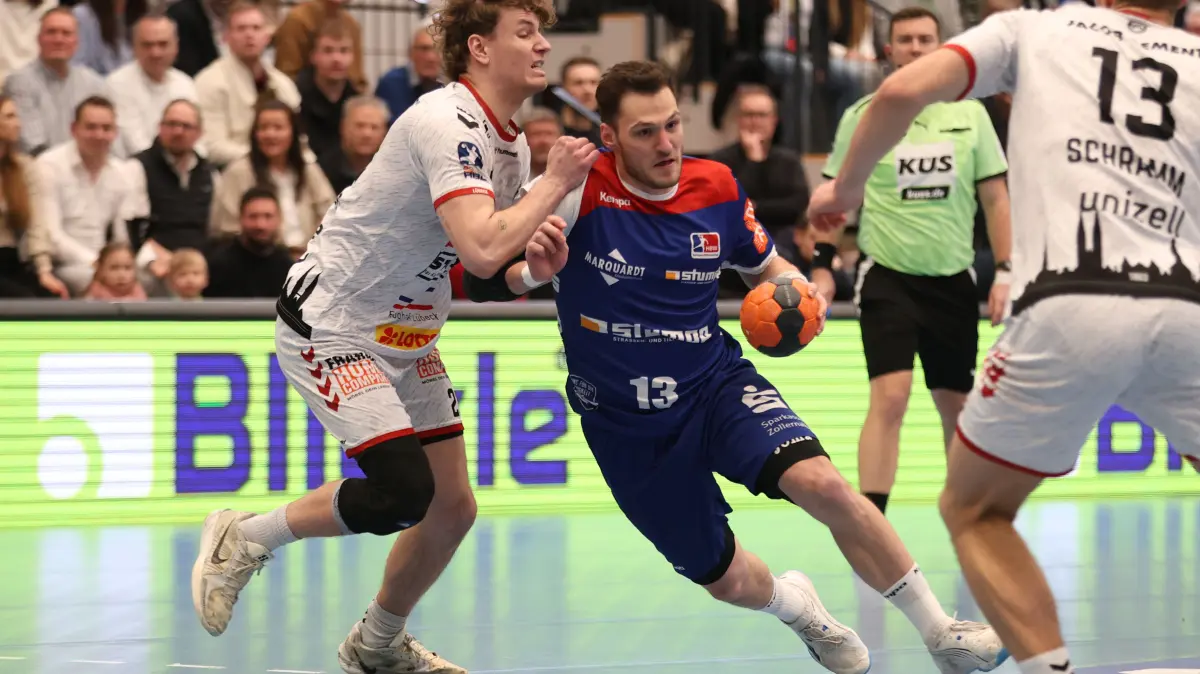HBW Balingen Weilstetten - VFL Luebeck-Schwartau, Handball 2.Bundesliga, Spieltag 20, Saison 2025/2026, 20.02.26 : Zweikampf, Duell, Kampf, tackle, duel, duel, fight, tackle Magnus Holpert (VfL Lübeck Schwartau, #22), Merlin Fuss (HBW Balingen-Weilstetten, #13)
HBW Balingen Weilstetten - VFL Luebeck-Schwartau, Handball 2.Bundesliga, 20.Spieltag, Saison 2025/2026, 20.02.26
Foto: Eibner-Pressefoto/Thiemann Kirsten