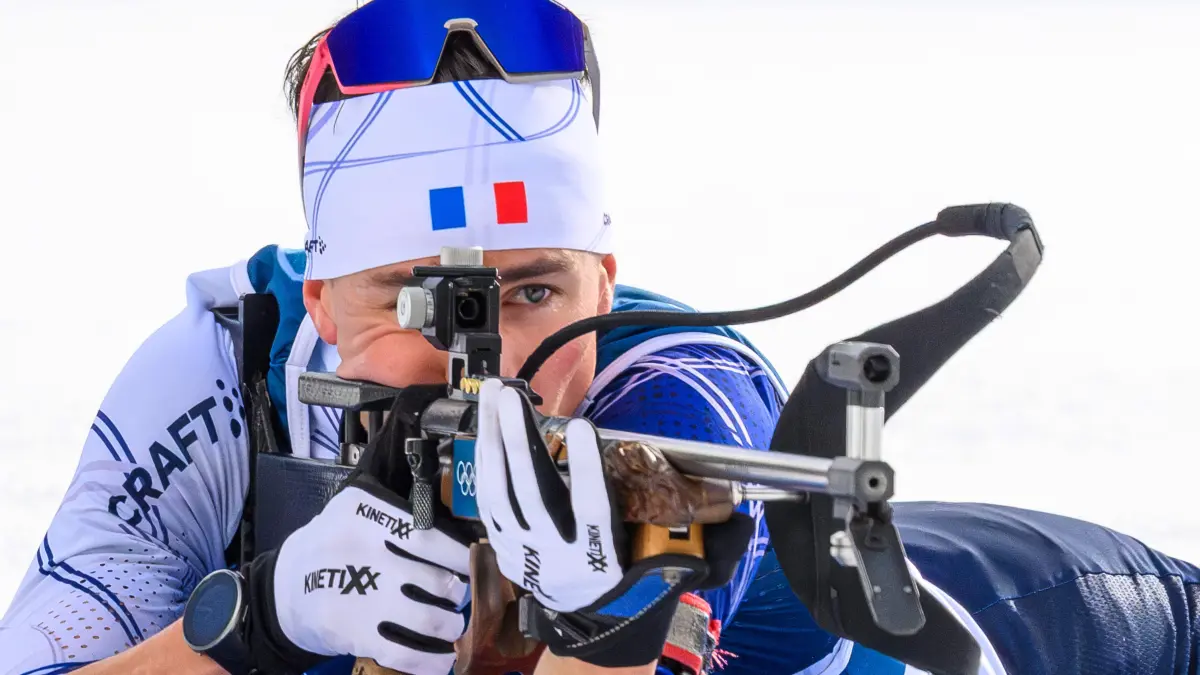 France's Eric Perrot competes at the shooting range during the men's biathlon 15km mass start event during the Milano Cortina 2026 Winter Olympic Games at the Anterselva Biathlon Arena (Sudtirol Arena) in Anterselva (Val Pusteria) on February 20, 2026. (Photo by FRANCOIS-XAVIER MARIT / AFP)