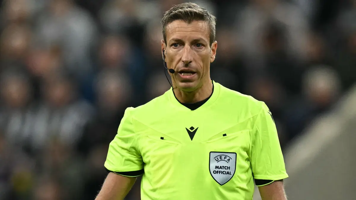 Italian referee Davide Massa, in charge of the UEFA Champion's League knockout round play-off, 2nd leg football match between Newcastle United and Qarabag at St James' Park in Newcastle-upon-Tyne, north east England on February 24, 2026. (Photo by Paul ELLIS / AFP)