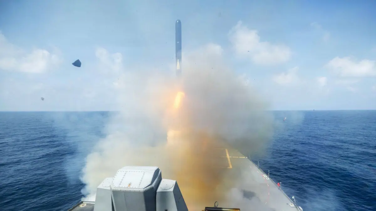 TOPSHOT - In this US Navy photo released on February 28, 2026 released by the US Central Command shows the Arleigh Burke class guided-missile-destroyer, USS Spruance (DDG 111), firing Tomahawk Land Attack Missiles in support of Operation Epic Fury, from an undisclosed location on February 28, 2026. The United States and Israel launched a wave of strikes against targets in Iran on February 28, sparking swift retaliation by the Islamic republic which responded with missile attacks across the region. (Photo by US Central Command (CENTCOM) / AFP) / RESTRICTED TO EDITORIAL USE - MANDATORY CREDIT "AFP PHOTO / US CENTCOM / US NAVY" - HANDOUT - NO MARKETING NO ADVERTISING CAMPAIGNS - DISTRIBUTED AS A SERVICE TO CLIENTS
