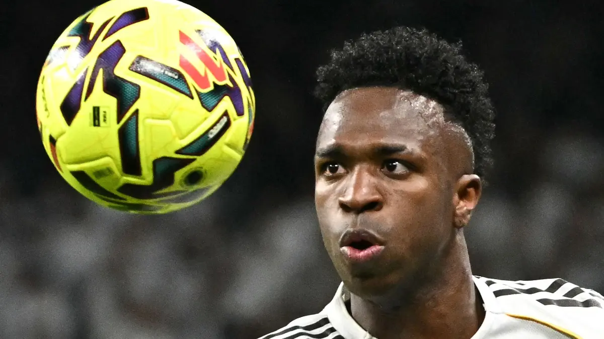 Real Madrid's Brazilian forward #07 Vinicius Junior stares at the ball during the Spanish league football match between Real Madrid CF and Getafe CF at Santiago Bernabeu Stadium in Madrid on March 2, 2026. (Photo by Javier SORIANO / AFP)