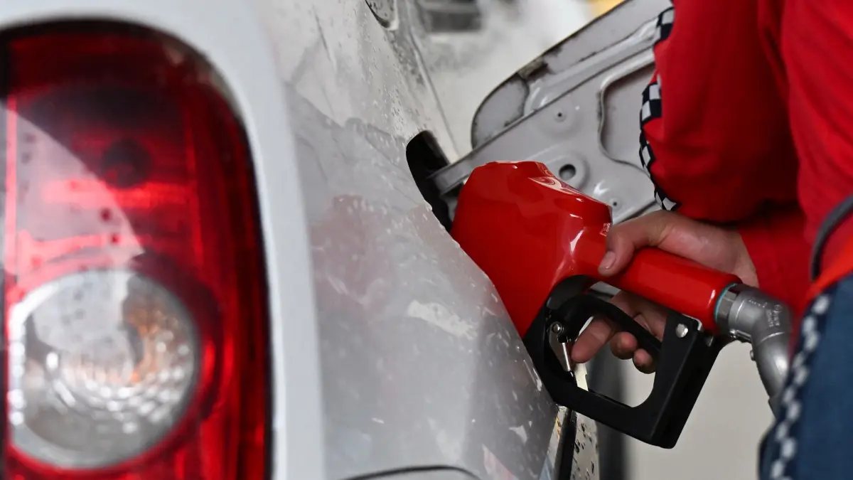 A worker fills the tank of a car at a gas station in Bogota on March 9, 2026. The Iran war sent oil prices soaring on March 9, 2026 after Tehran, under new leader Mojtaba Khamenei, fired a new barrage of missiles at its Gulf neighbours and signalled that the strategic Strait of Hormuz would likely remain shut.
With the Strait of Hormuz off Iran remaining closed to almost all oil tankers, the price of benchmark crude oil contracts rocketed past $100 a barrel on Monday -- their highest levels since Russia's invasion of Ukraine in 2022 -- before edging back slightly. (Photo by Diana SANCHEZ / AFP)