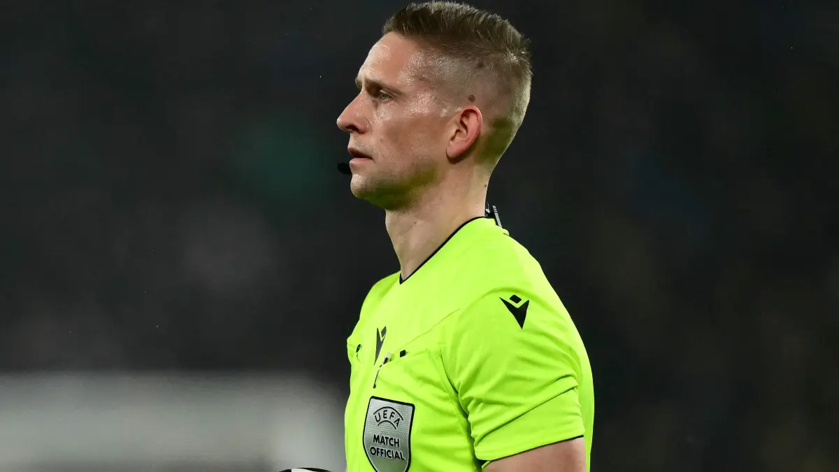 Norwegian referee Espen Eskas looks on during the UEFA Champions League last 16, first leg football match between Atalanta and Bayern Munich at the Gewiss stadium in Bergamo, on March 10, 2026. (Photo by Marco BERTORELLO / AFP)