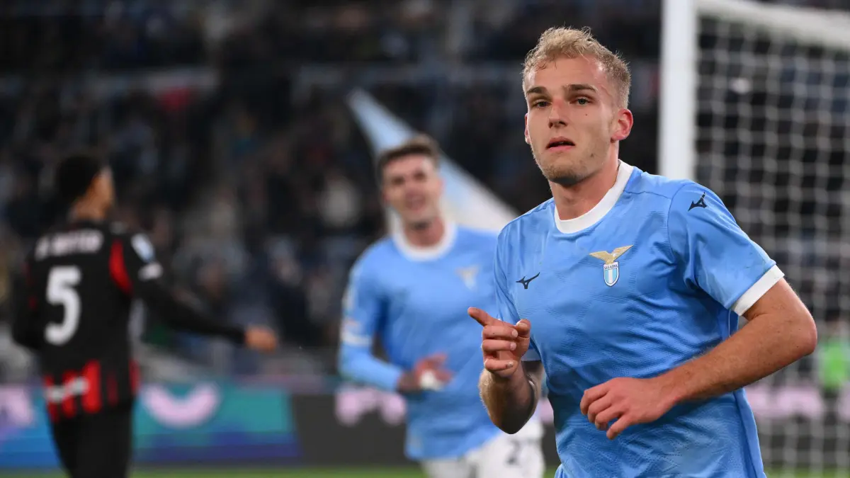Lazio's Danish forward #18 Gustav Isaksen (R) celebrates after scoring Lazio's first goal during the Italian Serie A football match between Lazio and AC Milan at the Olympic Stadium in Rome on March 15, 2026. (Photo by Alberto PIZZOLI / AFP)