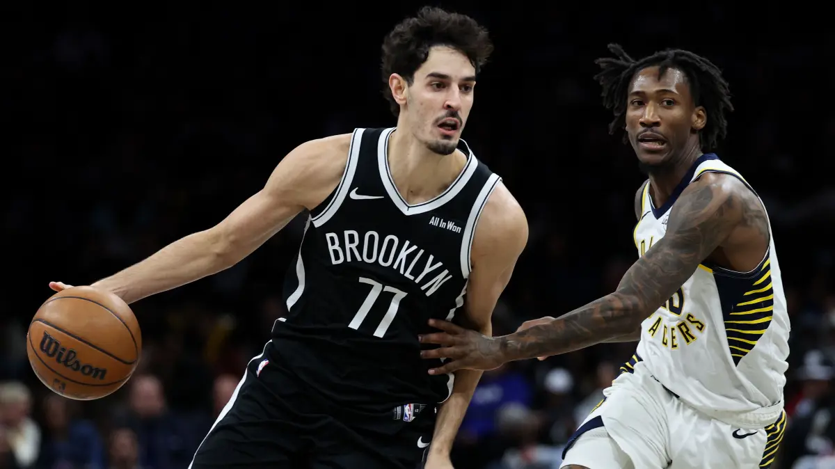 Indiana Pacers v Brooklyn Nets: NEW YORK, NEW YORK - APRIL 09: Ben Saraf #77 of the Brooklyn Nets dribbles while defended by Quenton Jackson #29 of the Indiana Pacers /d2h at Barclays Center on April 09, 2026 in New York City. NOTE TO USER: User expressly acknowledges and agrees that, by downloading and or using this photograph, User is consenting to the terms and conditions of the Getty Images License Agreement. Jordan Bank/Getty Images/AFP (Photo by Jordan Bank / GETTY IMAGES NORTH AMERICA / Getty Images via AFP)