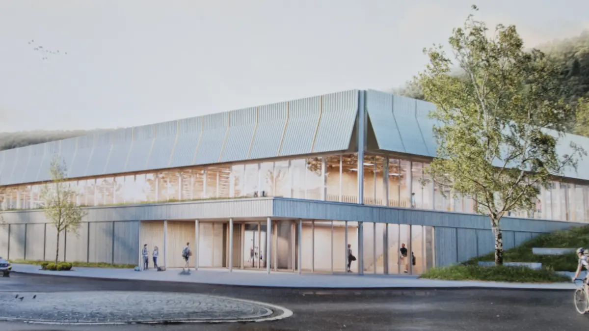 Eine Visualisierung des Siegerentwurfs zeigt den geplanten Haupteingang im Bereich des Kreisels. Das „grüne Entree“ soll die Sporthalle künftig attraktiv mit der Ihlinger Straße vernetzen.