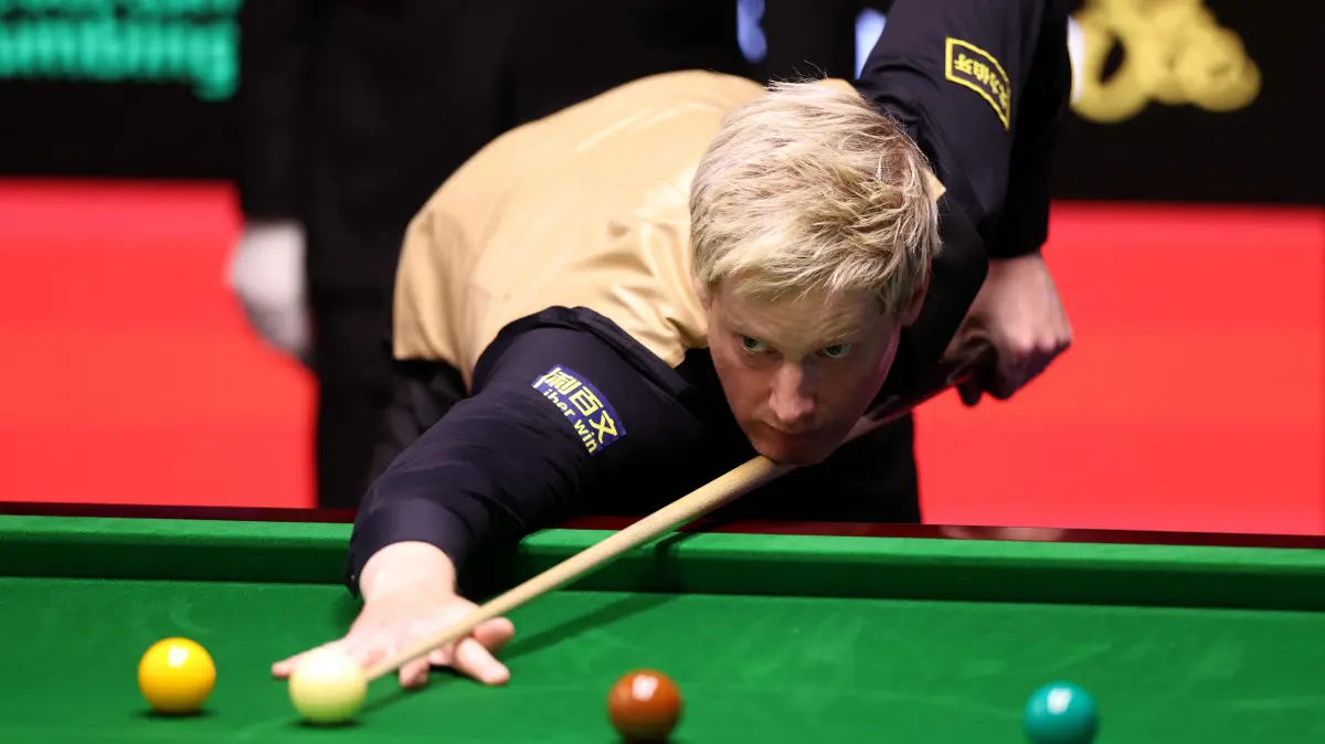 776479936: Australia's Neil Robertson plays a shot against China's Pang Junxu during the World Snooker Championship Round One match at The Crucible in Sheffield, northern England on April 22, 2026. The World Snooker Championship 2025 will take place from April 19 to May 5, 2025. (Photo by Darren Staples / AFP)
