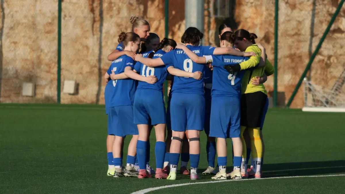 Mannschaftskreis vor dem Spiel.