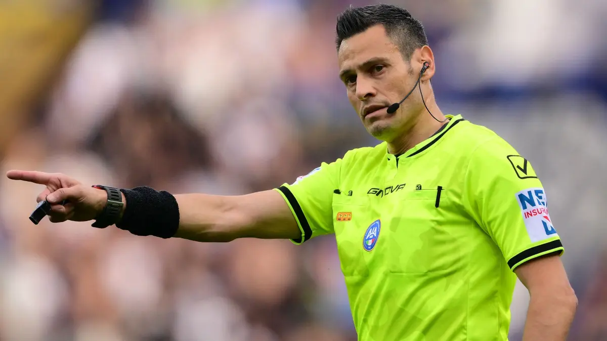 Italian referee Maurizio Mariani gestures during the Italian Serie A football match between Torino and Inter Milan at the Olympic Stadium Grande Torino in Turin on April 26, 2026. (Photo by MARCO BERTORELLO / AFP)