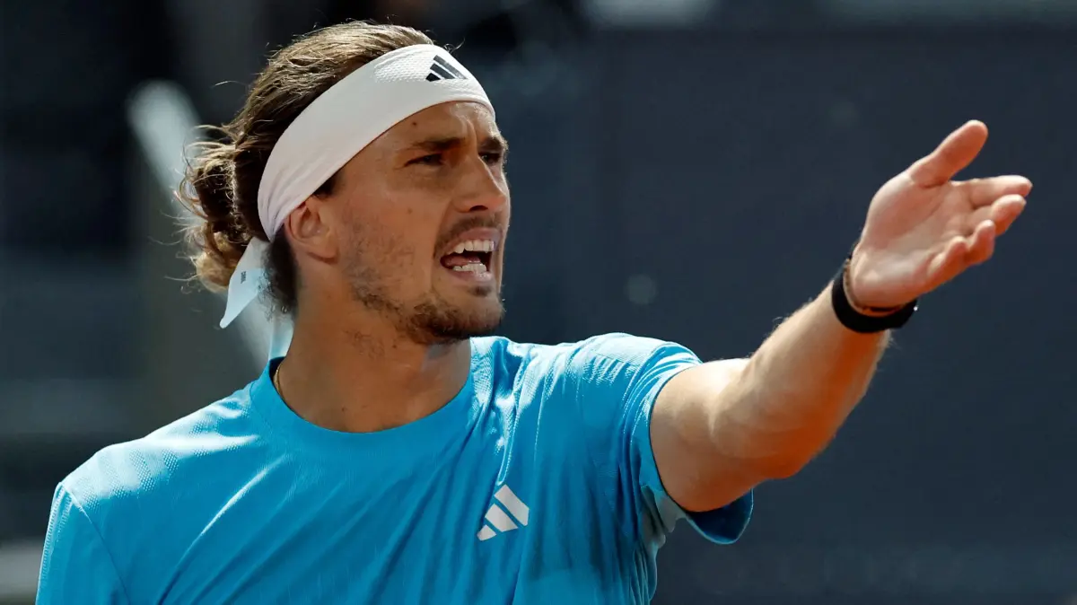 Germany's Alexander Zverev reacts during his 2026 ATP Tour Madrid Open tennis tournament singles match against Czech Republic's Jakub Mensik at the Caja Magica in Madrid, on April 28, 2026. (Photo by OSCAR DEL POZO / AFP)