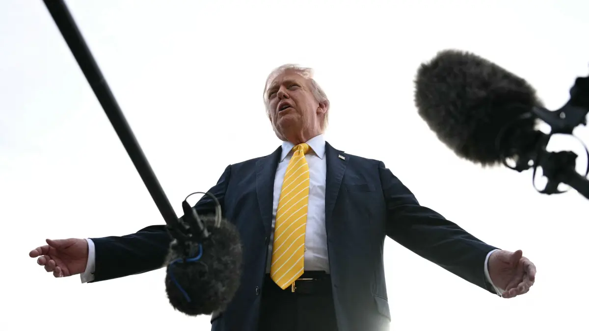 US President Donald Trump spends the week-end at his Mar-A-Lago residence: US President Donald Trump speaks with reporters at Palm Beach International Airport in West Palm Beach, Florida on May 2, 2026, before boarding Air Force One en route to Miami. (Photo by Jim WATSON / AFP)