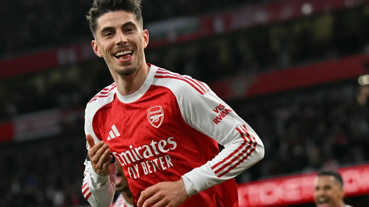 Arsenal's German midfielder #29 Kai Havertz celebrates scoring the opening goal during the English Premier League football match between Arsenal and Burnley at the Emirates Stadium in London on May 18, 2026. (Photo by Glyn KIRK / AFP) / RESTRICTED TO EDITORIAL USE. No use with unauthorized audio, video, data, fixture lists, club/league logos or 'live' services. Online in-match use limited to 120 images. An additional 40 images may be used in extra time. No video emulation. Social media in-match use limited to 120 images. An additional 40 images may be used in extra time. No use in betting publications, games or single club/league/player publications. /