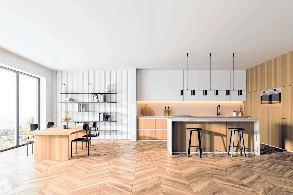 Beginnend beim Fußboden ist Holz ein wunderbares Material. Auch Holzmöbel, oft kombiniert mit Glas oder Metall, bringen lebendige Wärme in den Raum. ⇥Foto: ImageFlow/ adobe stock