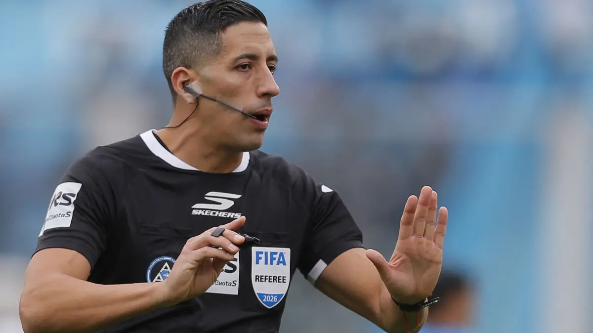 Referee Yael Falcon Perez gestures during the Argentine Professional Football League Apertura tournament final match between River Plate and Belgrano at Mario Alberto Kempes Stadium in Cordoba, Argentina on May 24, 2026. (Photo by Diego Lima / AFP)