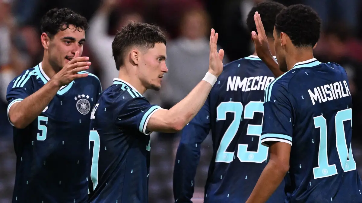 Germany's midfielder #17 Florian Wirtz (2L) celebrates scoring his team's second goal with teammates Germany's midfielder #05 Aleksandar Pavlovic (L), Germany's midfielder #23 Felix Nmecha, and Germany's midfielder #10 Jamal Musiala (R) during a friendly match between Germany and Finland ahead of the 2026 FIFA World Cup football tournament, in Mainz, western Germany on May 31, 2026. (Photo by Kirill KUDRYAVTSEV / AFP)
