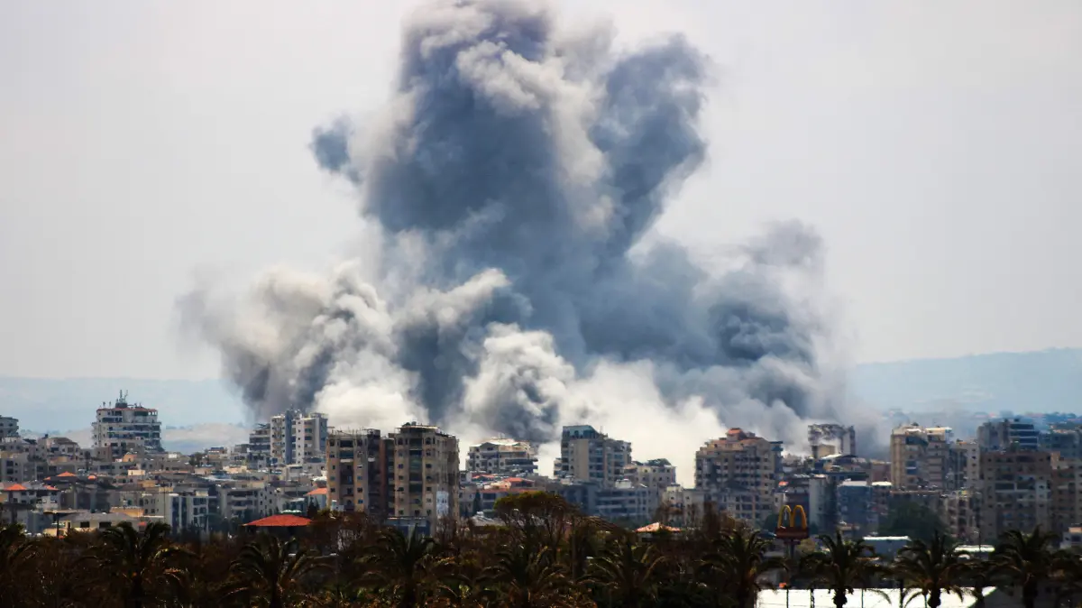 A plume of smoke rises following an Israeli airstrike on the outskirts of Tyre, southern Lebanon, on June 1, 2026. Iran's foreign ministry said on June 1 that a ceasefire in Lebanon remains a key condition for any deal with the United States to end the Middle East war. (Photo by KAWNAT HAJU / AFP)