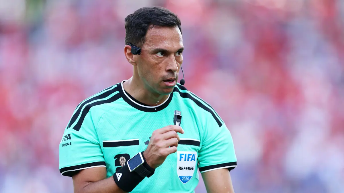 Canada v Bosnia and Herzegovina: Group B - FIFA World Cup 2026: TORONTO, ONTARIO - JUNE 12: Referee Facundo Tello looks on while wearing a mini referee camera during the FIFA World Cup 2026 Group B match between Canada and Bosnia and Herzegovina at Toronto Stadium on June 12, 2026 in Toronto, Ontario. Francois Nel/Getty Images/AFP (Photo by Francois Nel / GETTY IMAGES NORTH AMERICA / Getty Images via AFP)