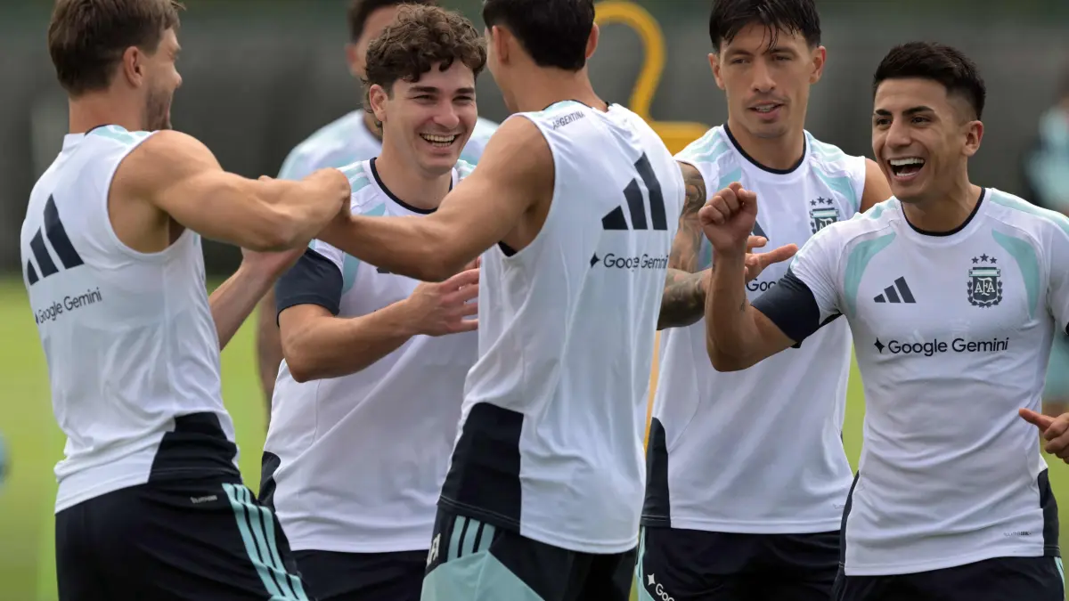 Argentina's forward #09 Julian Alvarez (2ndL) shares a laugh with teammates during a training session ahead of Argentina's 2026 World Cup football tournament Group A football match against Algeria in Kansas City on June 13, 2026. (Photo by JUAN MABROMATA / AFP)