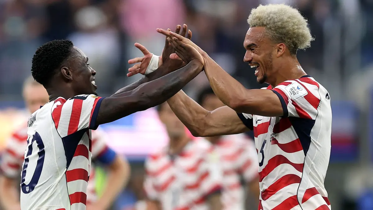 USA v Paraguay: Group D - FIFA World Cup 2026: LOS ANGELES, CALIFORNIA - JUNE 12: Folarin Balogun #20 of the United States celebrates scoring his team's second goal with Antonee Robinson #5 during the FIFA World Cup 2026 Group D match between USA and Paraguay at Los Angeles Stadium on June 12, 2026 in Inglewood, California. Jamie Squire/Getty Images/AFP (Photo by JAMIE SQUIRE / GETTY IMAGES NORTH AMERICA / Getty Images via AFP)