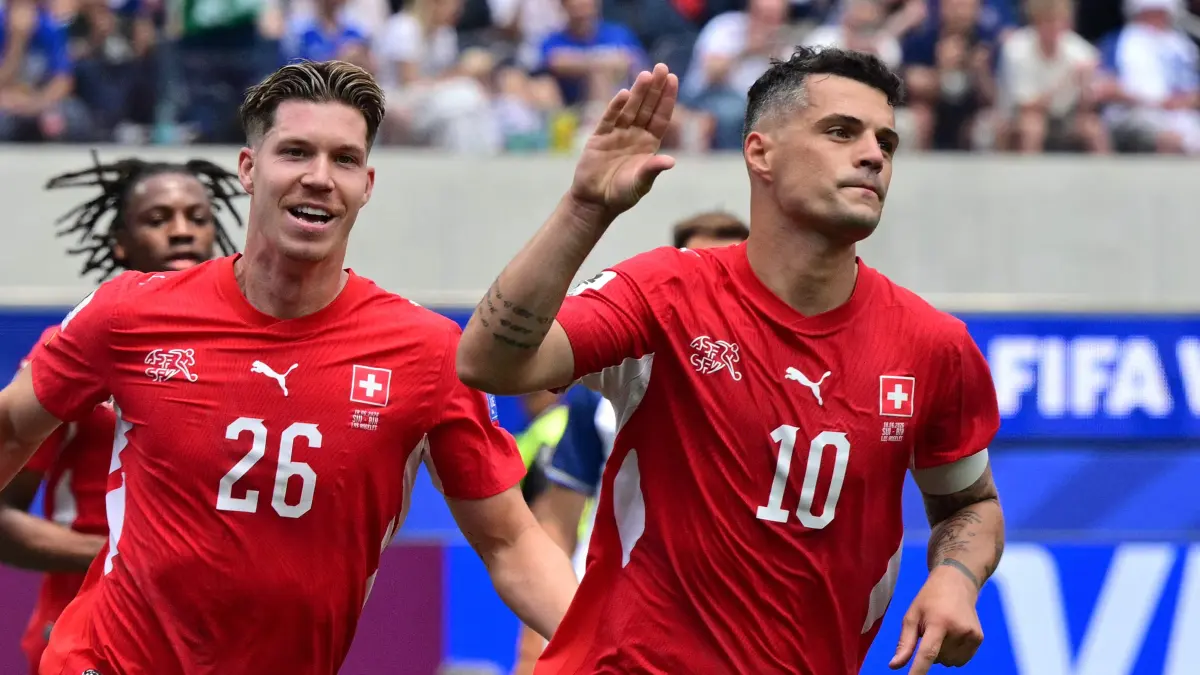 FBL-WC-2026-MATCH26-SUI-BIH: Switzerland's midfielder #10 Granit Xhaka celebrates scoring his team's fourth goal during the 2026 World Cup Group B football match between Switzerland and Bosnia and Herzegovina at Los Angeles Stadium in Inglewood on June 18, 2026. (Photo by Frederic J. Brown / AFP)