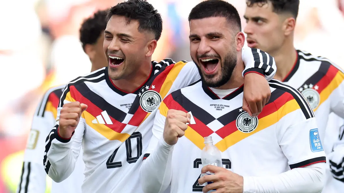 Germany v Cote D'Ivoire: Group E - FIFA World Cup 2026: TORONTO, ONTARIO - JUNE 20: Nadiem Amiri #20 and Deniz Undav #26 of Germany celebrate the team's 2-1 victory in the FIFA World Cup 2026 Group E match between Germany and Cote D'Ivoire at Toronto Stadium on June 20, 2026 in Toronto, Ontario. Alexander Hassenstein/Getty Images/AFP (Photo by ALEXANDER HASSENSTEIN / GETTY IMAGES NORTH AMERICA / Getty Images via AFP)