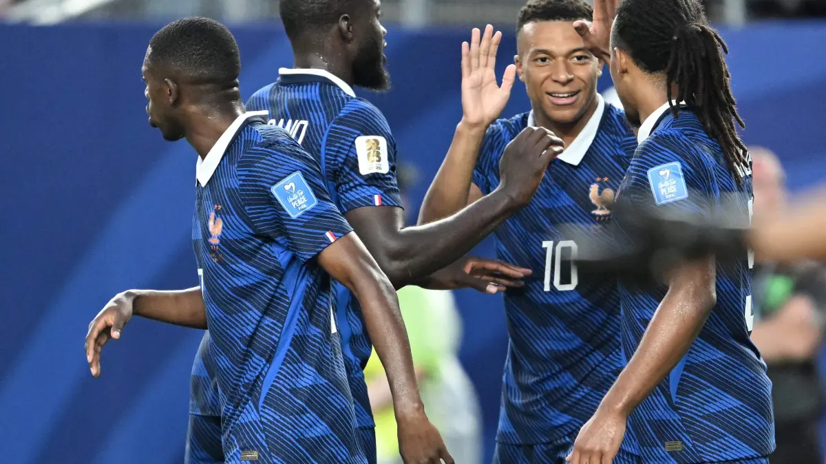 TOPSHOT-FBL-WC-2026-MATCH42-FRA-IRQ: TOPSHOT - France's forward #10 Kylian Mbappe celebrates scoring his team's second goal with teammates during the 2026 World Cup Group I football match between France and Iraq at the Philadelphia Stadium in Philadelphia on June 22, 2026. (Photo by ROBERTO SCHMIDT / AFP)