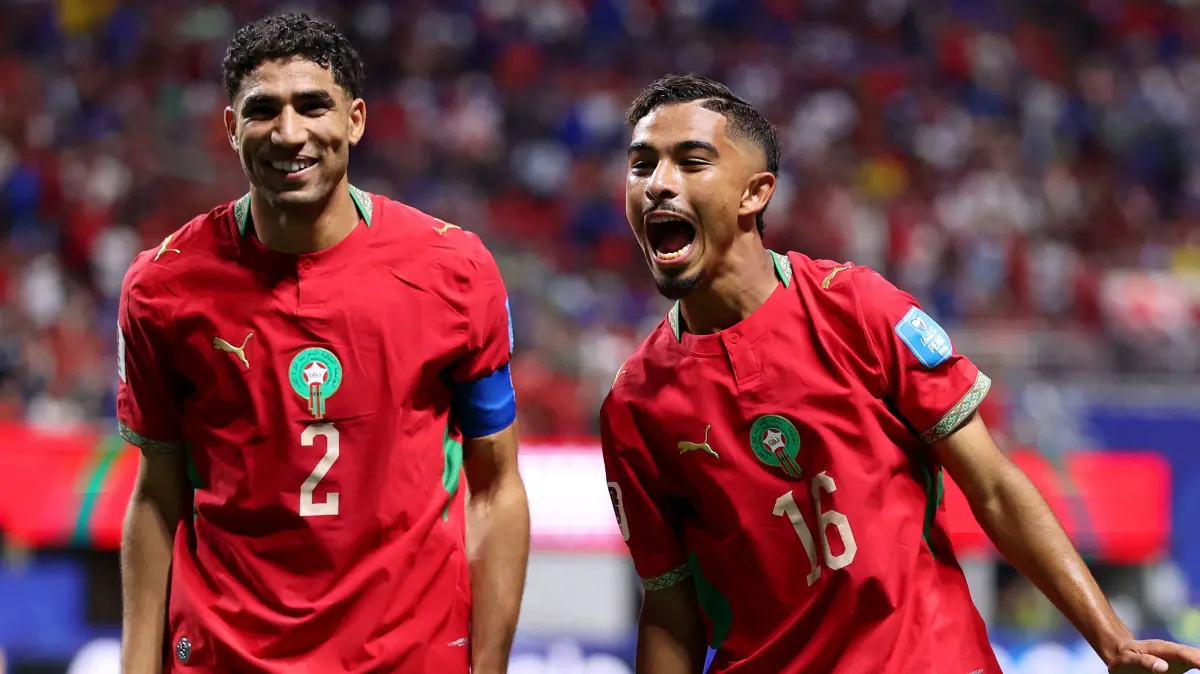 Morocco v Haiti: Group C - FIFA World Cup 2026: ATLANTA, GEORGIA - JUNE 24: Gessime Yassine #16 of Morocco celebrates with teammate Achraf Hakimi #2 after scoring his team's fourth goal during the FIFA World Cup 2026 Group C match between Morocco and Haiti at Atlanta Stadium on June 24, 2026 in Atlanta, Georgia. Kevin C. Cox/Getty Images/AFP (Photo by Kevin C. Cox / GETTY IMAGES NORTH AMERICA / Getty Images via AFP)
