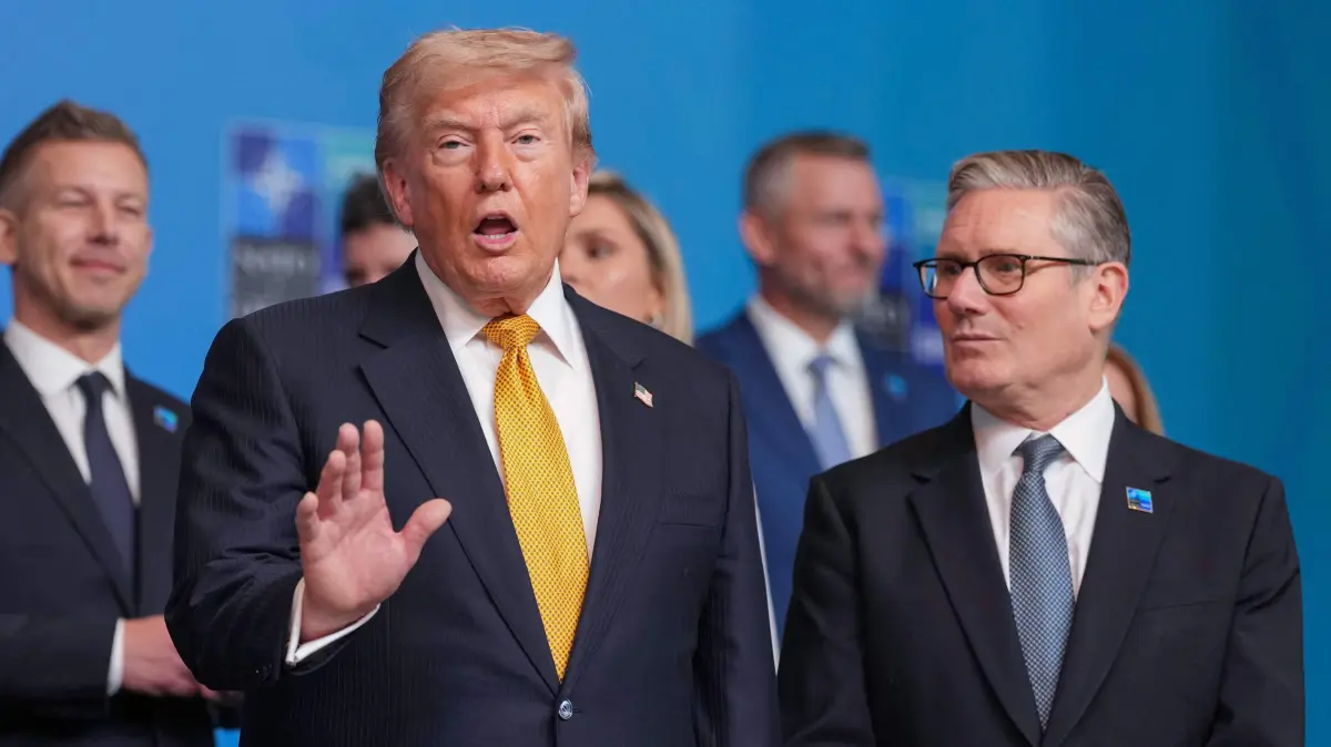 TURKEY-NATO-SUMMIT-DEFENCE: US President Donald Trump gestures next to Britain's Prime Minister Keir Starmer as he arrives for the NATO Summit at Bestepe Presidential Compound in Ankara, Turkey, July 8, 2026. The summit comes at a fraught time for the 77-year-old transatlantic alliance, with the US President demanding members make good on a pledge to ramp up defence spending as Washington takes a step back from Europe. (Photo by Alastair Grant / POOL / AFP)