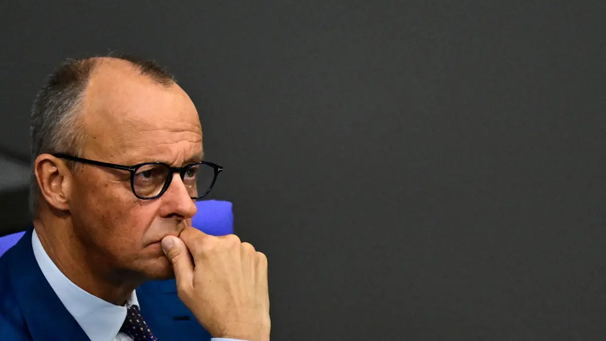 GERMANY-POLITICS-PARLIAMENT: German Chancellor Friedrich Merz listens to speeches during a session at the at the Bundestag, the lower house of parliament, in Berlin, on July 9, 2026. (Photo by John MACDOUGALL / AFP)