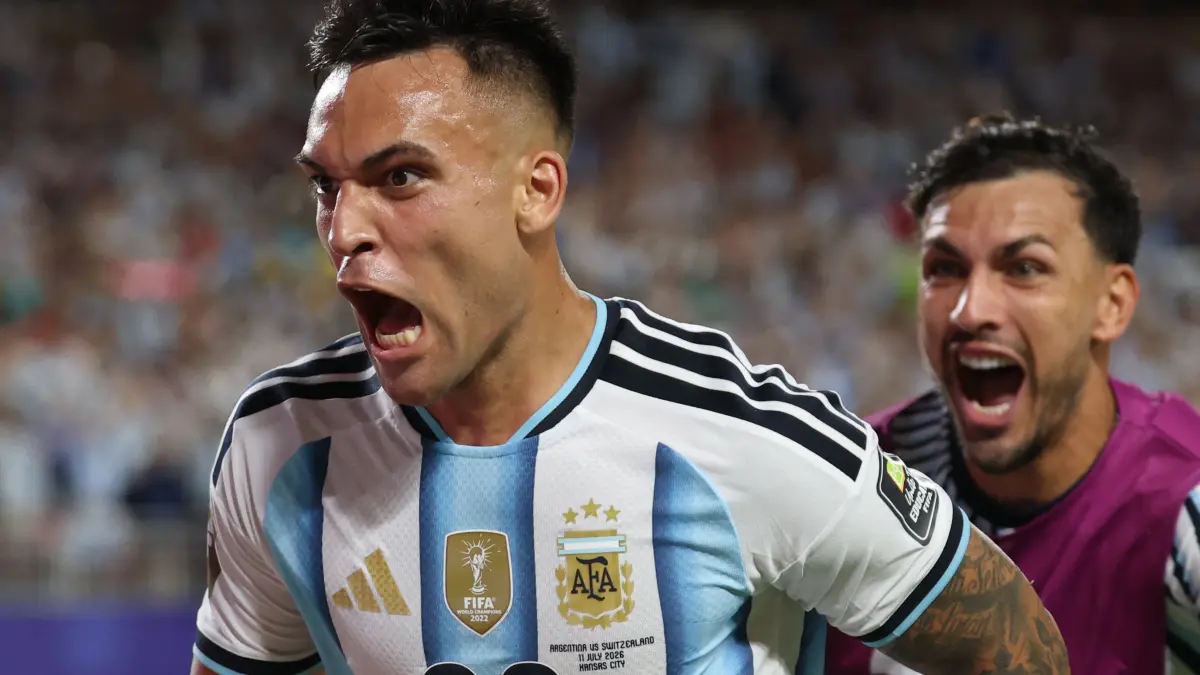 FBL-WC-2026-MATCH100-ARG-SUI: Argentina's forward #22 Lautaro Martinez celebrates scoring his team's third goal with Argentina's midfielder #05 Leandro Paredes during the 2026 World Cup football tournament quarter-final match between Argentina and Switzerland at the Kansas City Stadium in Kansas City on July 11, 2026. (Photo by Odd ANDERSEN / AFP)