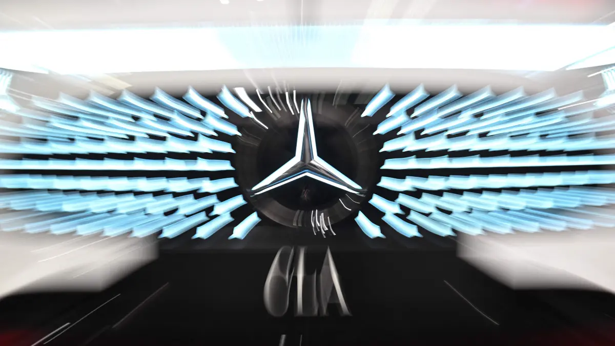 GERMANY-MERCEDES BENZ-FILES-GERMANY-ECONOMY-AUTOMOBILE-EARNINGS-: (FILES) A Mercedes star, logo of Mercedes-Benz Group AG, is seen on the front of a Mercedes-Benz CLA passenger car in Sindelfingen, southern Germany, on February 12, 2026, prior to the Annual Result Conference of the Mercedes-Benz Group. Premium German carmaker Mercedes-Benz on July 28, 2026 reported falling profit at its car business as it wrote off over 700 million euros due to fierce competition in China. (Photo by THOMAS KIENZLE / AFP)