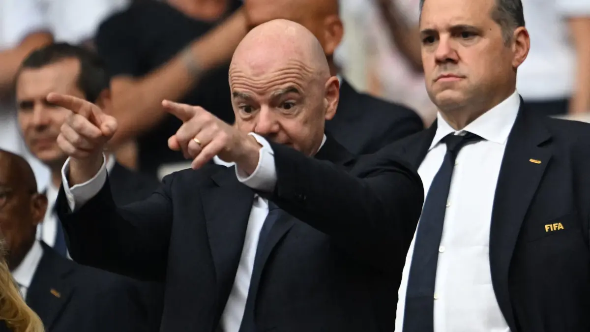 FILES-FBL-ECONOMY-FIFA-CONCACAF: (FILES) FIFA President Gianni Infantino (L) and CONCACAF President Victor Montagliani attend the 2026 World Cup football tournament quarter-final match between Norway and England at Miami Stadium in Miami on July 11, 2026. CONCACAF, which comprises 41 football associations from North America, Central America and the Caribbean, formally rejected FIFA’s proposal to open up the organisation to private investors on Thursday, it announced following a meeting of its members. (Photo by ROBERTO SCHMIDT / AFP)