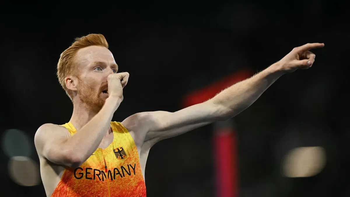 ATHLETICS-EUR-2026: Gold medallist Germany's Frederik Ruppert celebrates after winning the men's 3000m steeplechase final during the European Athletics Championships at Alexander Stadium in Birmingham on August 16, 2026. (Photo by Paul ELLIS / AFP)