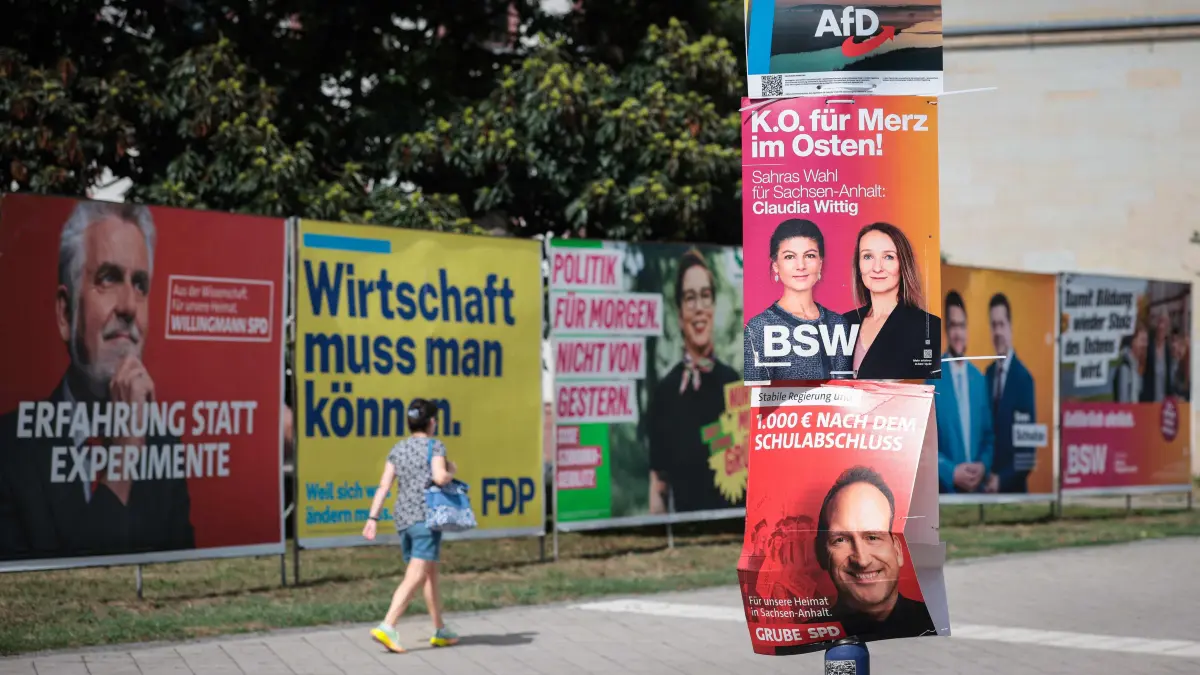 GERMANY-POLITICS-PARTIES-VOTE-SAXONY ANHALT: Billboards and election posters featuring election campaign ads for various parties are pictured in Magdeburg, eastern Germany on August 20, 2026. Regional elections in the eastern federal state of Saxony-Anhalt will take place on September 6, 2026, and two weeks later, the state of Mecklenburg-Western Pomerania and the capital Berlin itself will also elect their state assemblies on September 20, 2026. (Photo by Ronny HARTMANN / AFP)