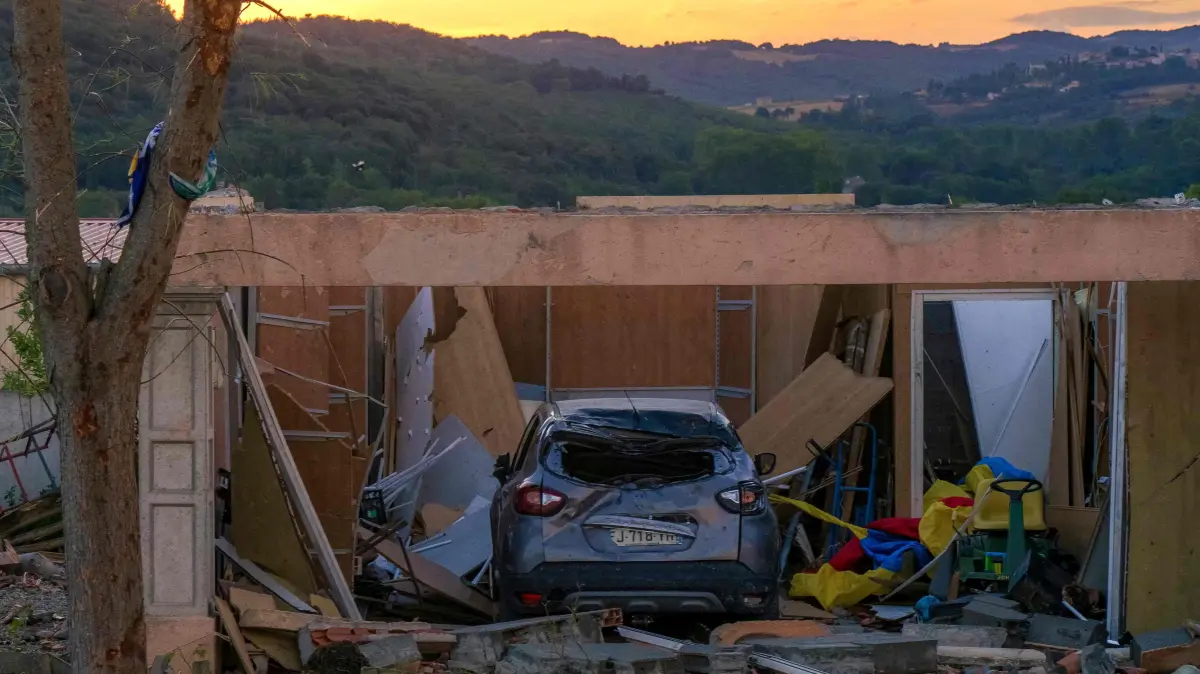 FRANCE-WEATHER-TORNADO: This photograph taken on August 24, 2026, shows damaged houses after a tornado struck Pomas, southwestern France. A tornado struck the Aude department on August 24 as part of southwestern France remained under an orange storm alert, with several rooftops torn off in the village of Pomas, an AFP photographer at the scene reported. (Photo by Idriss Bigou-Gilles / AFP)