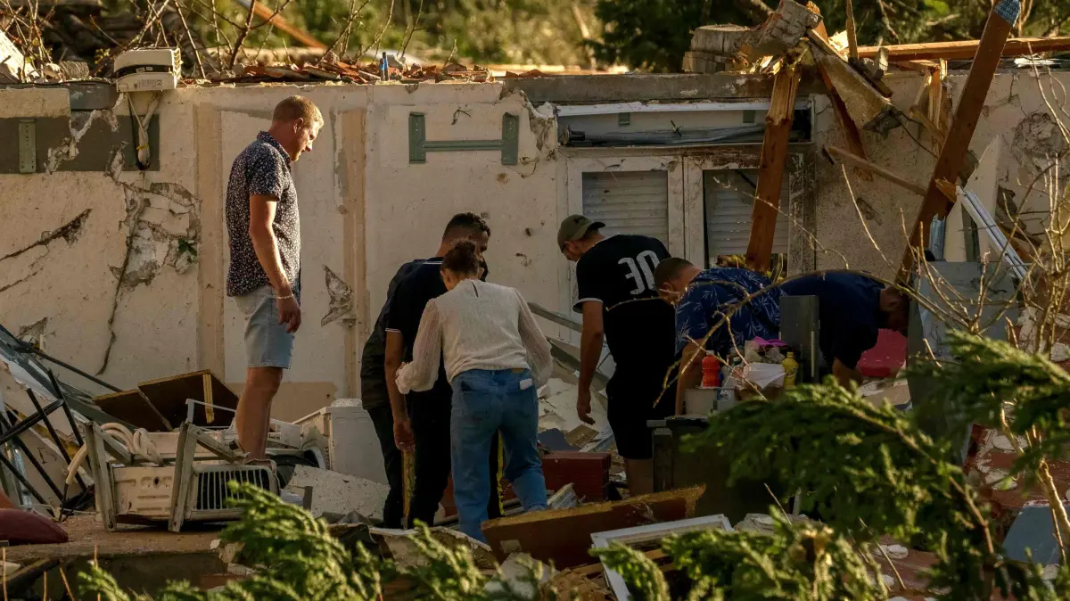 FRANCE-WEATHER-TORNADO: This photograph taken on August 24, 2026, shows a damaged structure after a tornado struck Pomas, southwestern France. A tornado struck the Aude department on August 24 as part of southwestern France remained under an orange storm alert, with several rooftops torn off in the village of Pomas, an AFP photographer at the scene reported. (Photo by Idriss Bigou-Gilles / AFP)