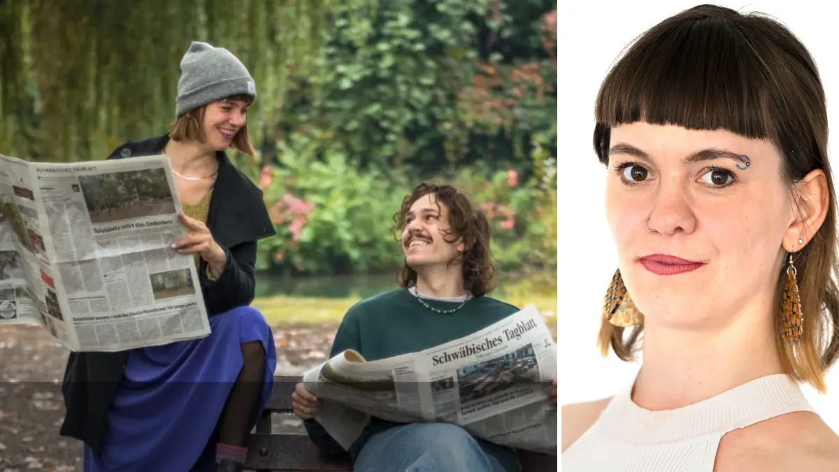 Miri Watson schlägt vor sich hinter der Zeitung zu verstecken