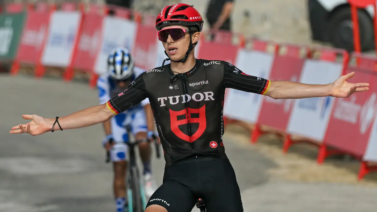 CYCLING-ESP-VUELTA: Team Tudor Pro Cycling Team's German rider Marco Brenner celebrates winning the 14th stage of the Vuelta a Espana 2026 cycling tour, a 154,5 km race between Jaen and Sierra de la Pandera, on September 5, 2026. (Photo by JORGE GUERRERO / AFP)