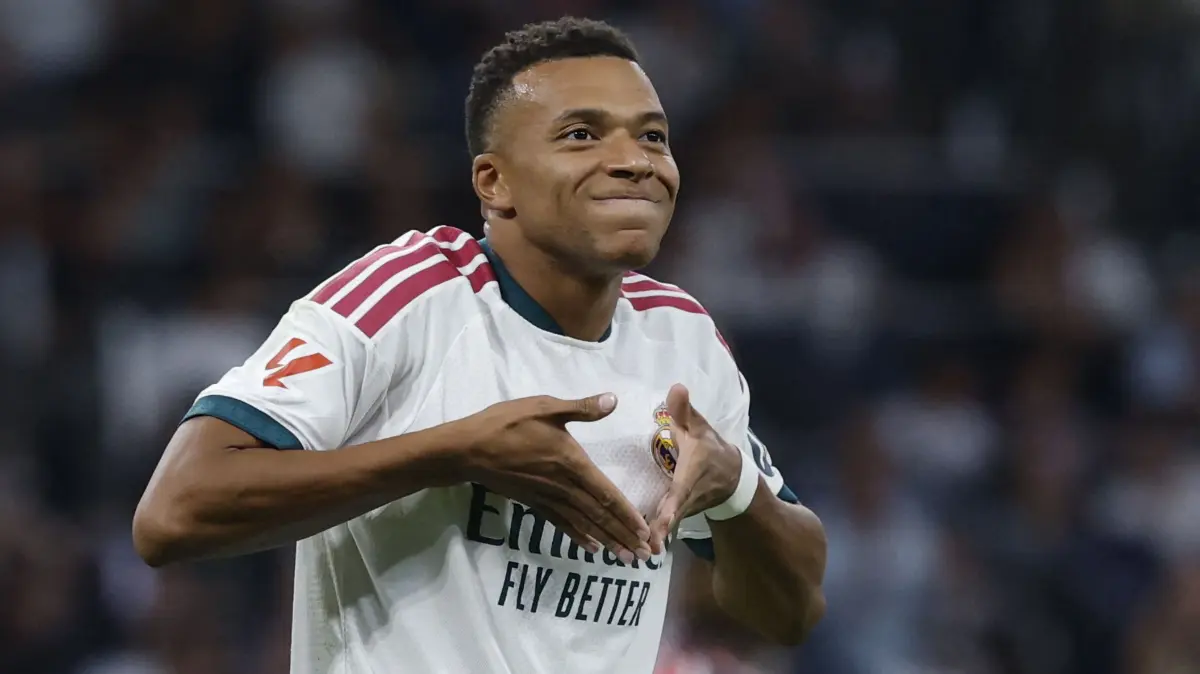 FBL-ESP-LIGA-REAL MADRID-RAYO: Real Madrid's French forward #10 Kylian Mbappe celebrates scoring the opening goal during the Spanish league football match between Real Madrid CF and Rayo Vallecano de Madrid at Santiago Bernabeu Stadium in Madrid on September 12, 2026. (Photo by Oscar DEL POZO / AFP)