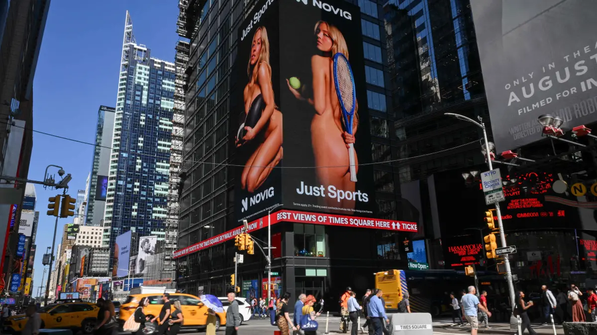 US-SPORT-OLY-GENDER-ENTERTAINMENT-ADVERTISING-SWEENEY: US actress Sydney Sweeney appears in an advertising campaign for sports betting app Novig on a billboard in Times Square in New York City on September 15, 2026. Actor Sydney Sweeney has been condemned by leading women athletes for a sports betting advert in which the American appears in various states of undress. (Photo by ANGELA WEISS / AFP)